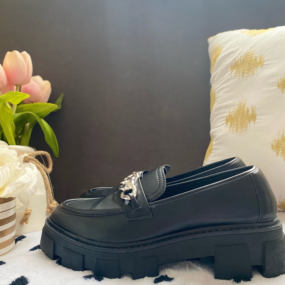 Black platform loafers